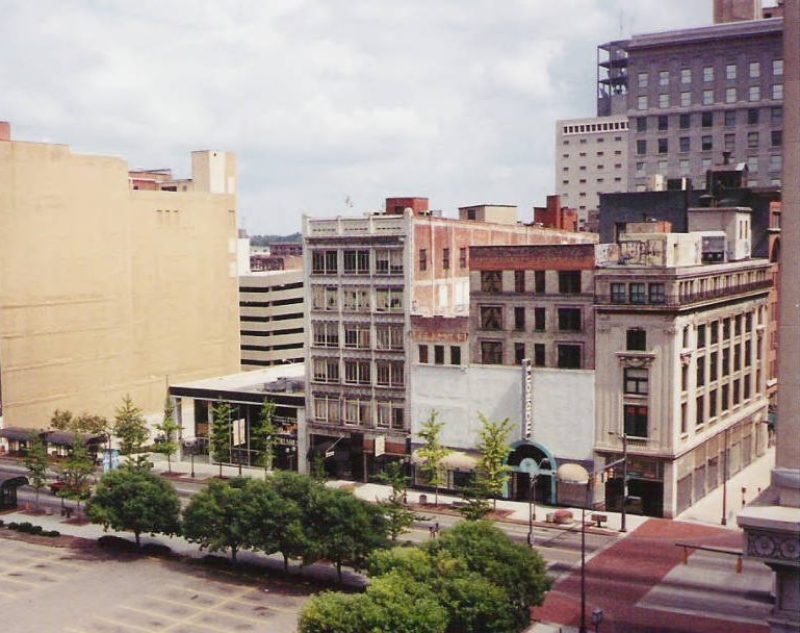 A view of the east side of North High Street between Gay Street and Long Street. Buildings featured include, from left to right: the High Long Building, 114-120 North High Street, the old Z. L. White Company building (and former J.C. Penney Department Store), 106 North High Street, the Greater Columbus Convention and Visitors Bureau, 90 North High Street, the White-Haines Building, 82 North High Street, the former Madison's store building, 72 North High Street, and the Old Columbus Dispatch Building, 68 North High Street.